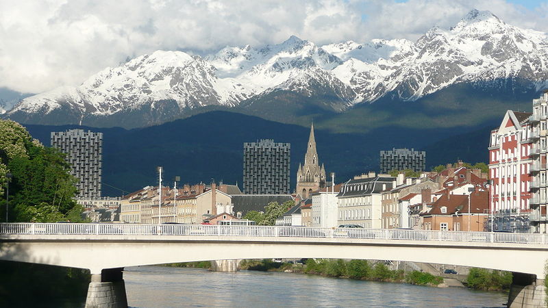Grenoble, France - Bridge over river Isere with view on the alps